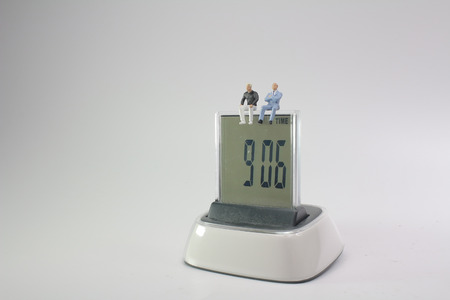 business figure with clock money and financial の写真素材