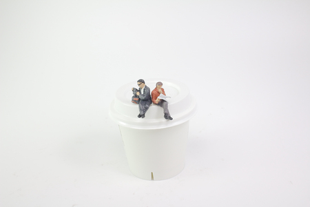 Close up of old business mini figure sittingの写真素材