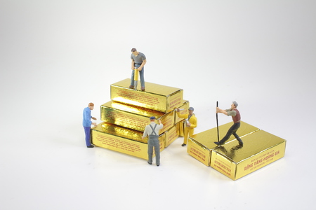 the worker figure moving of the gold, の写真素材