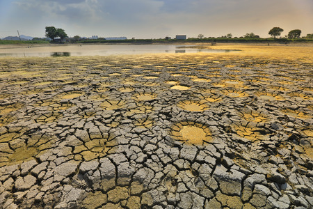a desert with wet place on it,  Tai Sang Wai 