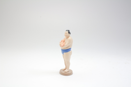 a figure of Sumo wrestler in traditional rackの写真素材