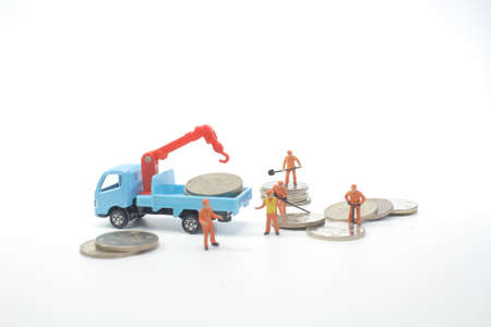 Road works with mini workers in a country