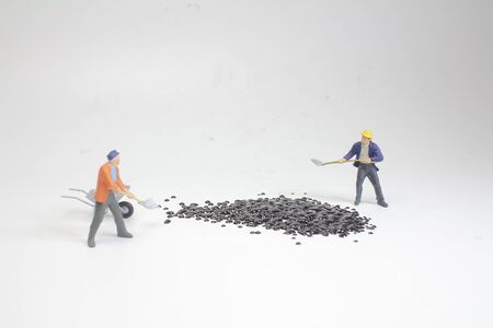 mini figures working on coffee at macroの写真素材