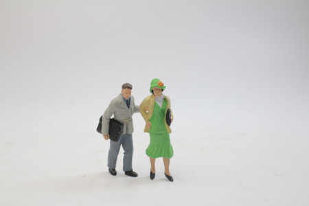 Some tiny business figure people on stage