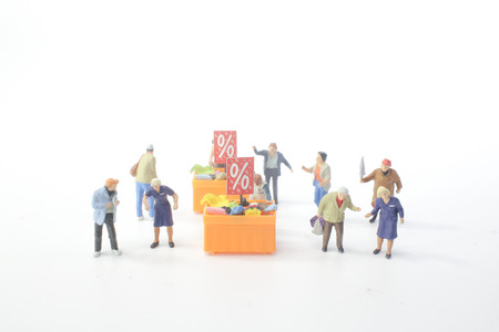a Mini people Shoppers buy goods on saleの写真素材