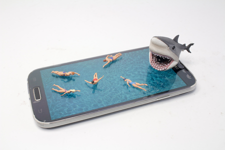 a Cyber thief hacker figure holding fishingの写真素材