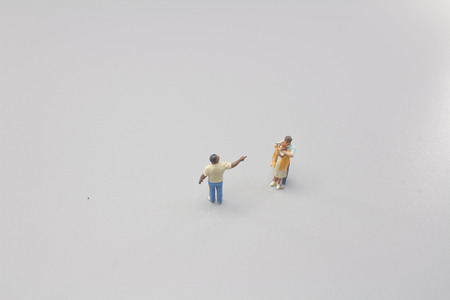 the small of figure are fighting on boardの写真素材