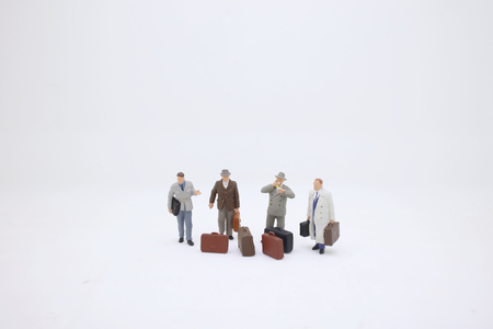 the mini business  traveler figure standing onの写真素材