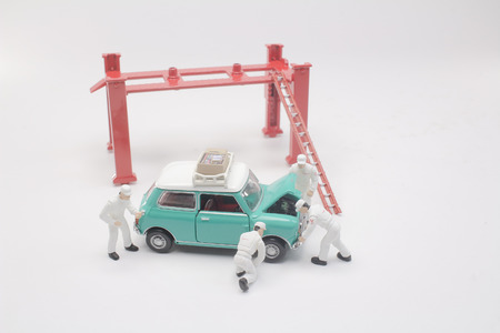 a tiny of the service station with figure