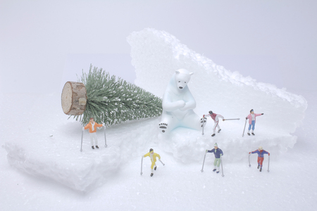 figurine  playing  with snow slider.の写真素材