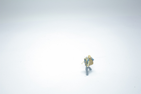 the tiny figures with backpack at boardの写真素材