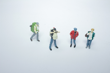 the tiny figures with backpack at boardの写真素材