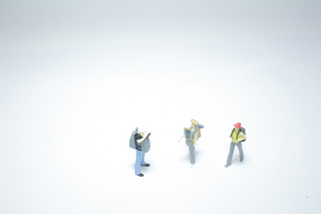 the tiny figures with backpack at boardの写真素材