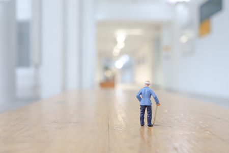 a small figure of Old man walkの写真素材