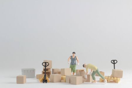 construction and logistics concept, tiny of figure workerの写真素材