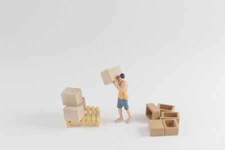 construction and logistics concept, tiny of figure workerの写真素材
