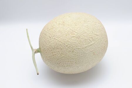 Honeydew Melon on a white backgroundの写真素材