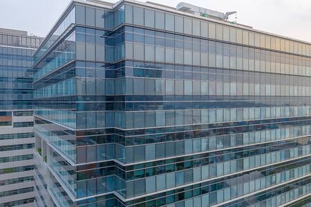 Reflected in Windows of Modern Office Building ,26 Oct 2019