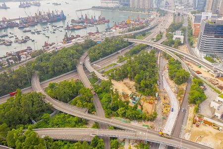 26 Oct 2019, Aerial view drone photography highway that cut the middle of the residtial community in Hong Kongの写真素材