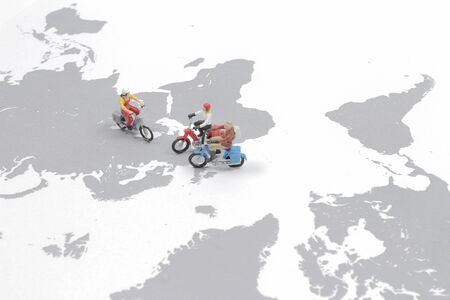 mini figure of biker travel around the world