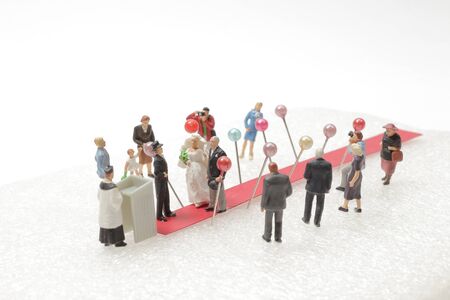 mini wedding figure, people attend to wedding ceremonyの写真素材