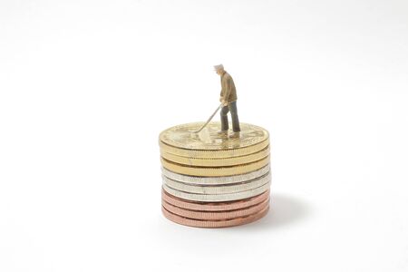 Golden Bitcoin and mini figure worker. Bitcoin concept. copy space background for text.