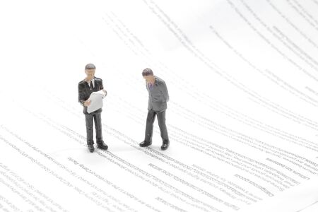 a mini of Different Businessmen Isolated on text papreの写真素材
