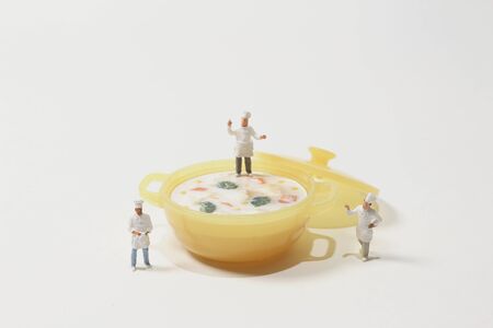toy figure of chef are preparation of raw materials for cooking