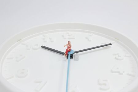 Time and Travel concept. Close up of miniature baggage with figureの写真素材