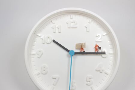 the mini worker move Furniture on the clock