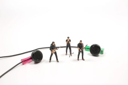 the mini figure withe band show near earphoneの写真素材