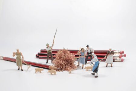 figurine character as construction worker repairman working check and repair sharpener pencil...