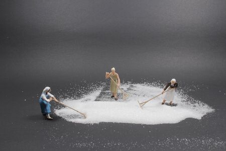 the fun of Mini worker is cleaning a keyboardの写真素材