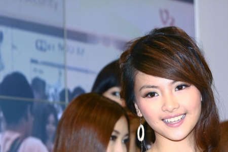 Hong Kong 23 Aug 2008 : Beautiful hostess at computer exhibitionのeditorial素材