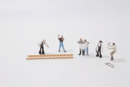 Small figure of worker, a construction project の写真素材