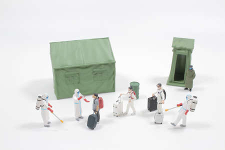 the mini figure revision point to take temperature facing the covid-19の写真素材