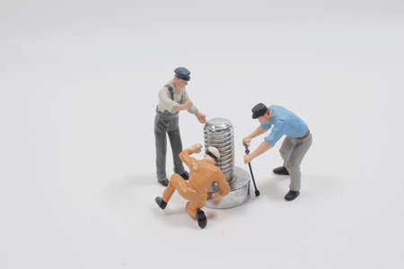 Worker pick up the screw. Image use for background business concept