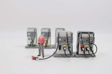the scale of Oil filling station, red green and  yellow color fuel gasoline