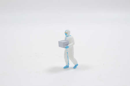 a Doctor wear the isolation gown or protective suits and surgical face masks