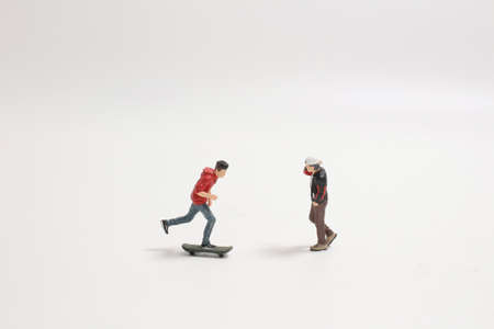 a Happy of figure Teen Boys, Performing Stunt on Skateboardの写真素材