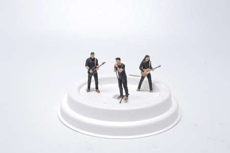 a Miniature Singer And Guitar Player Standingの写真素材