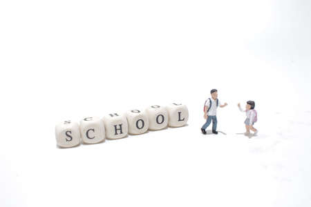 the fun of kids figure stand on the cubeの写真素材