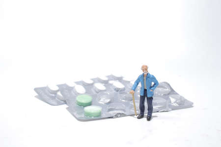 the figure of old man with the Colorful drugsの写真素材