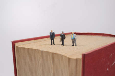 the business figure walk on the bookの写真素材