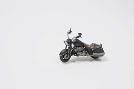the scale of Toy motorbike on a white background