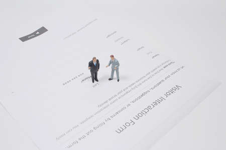 the mini of figure stand on the vistor interaction formの写真素材