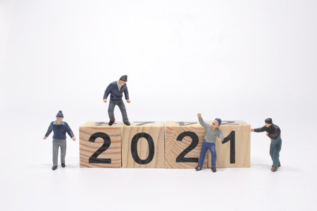 the figure with the 2021 figure on wooden cubes.