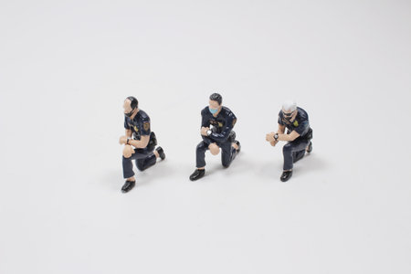 figurine standing on one knee, black lives matter conceptの写真素材