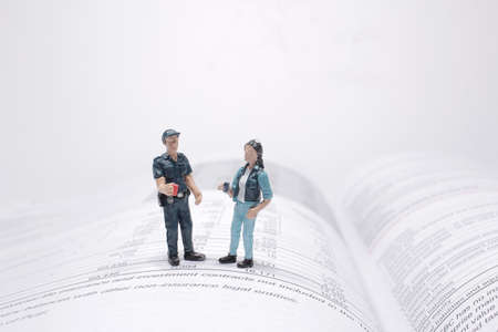 the close up of miniature people with social network
