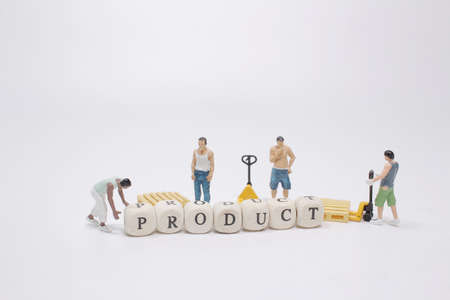 mini worker with wood letters making product analysis text